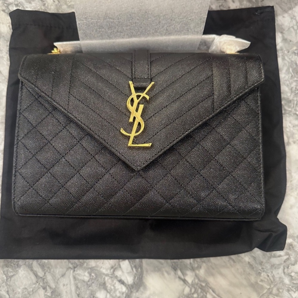 Yves Saint Laurent Black Quilted Clutch with Gold Logo